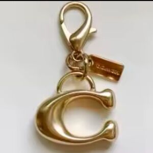 COACH SIGNATURE “C” BAG CHARM